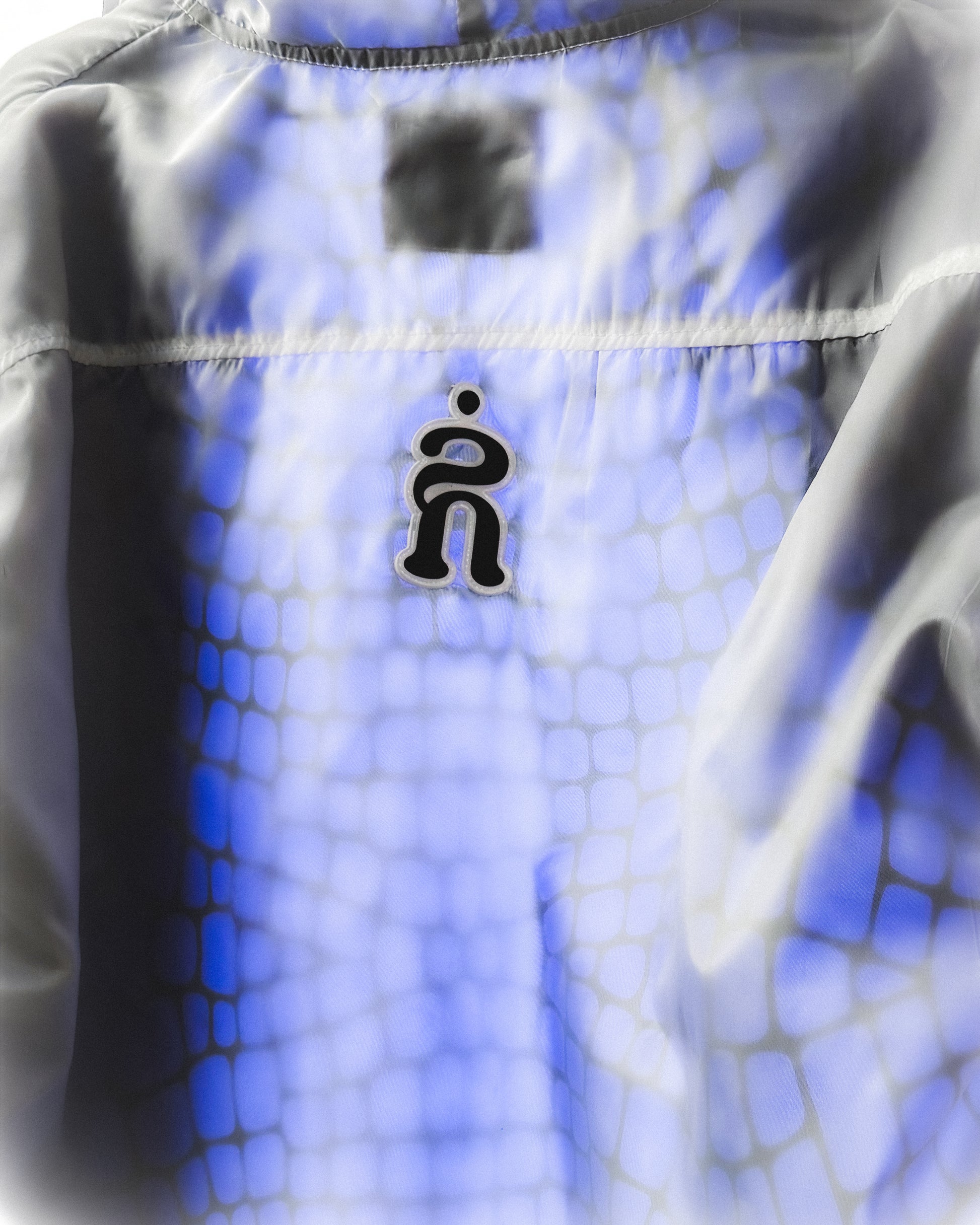 BI-LAYER RAIN JACKET